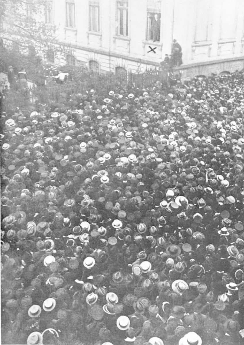 Philipp Scheidemann addresses a crowd from a window of the Reich Chancellery, 9 November 1918.