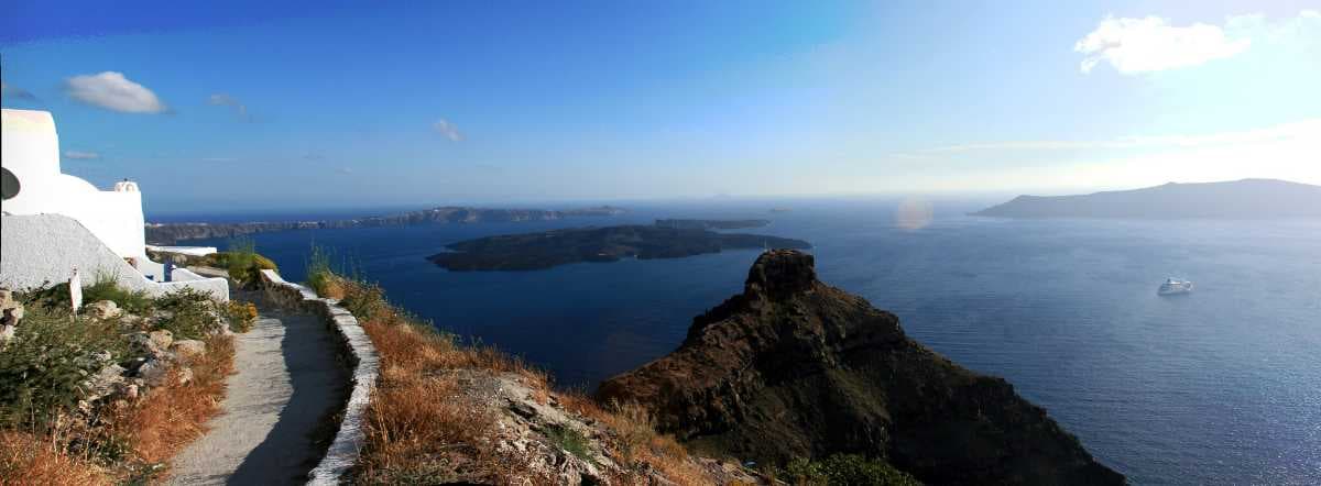 View of the volcanic island Nea Kamini from the Imerovigli town