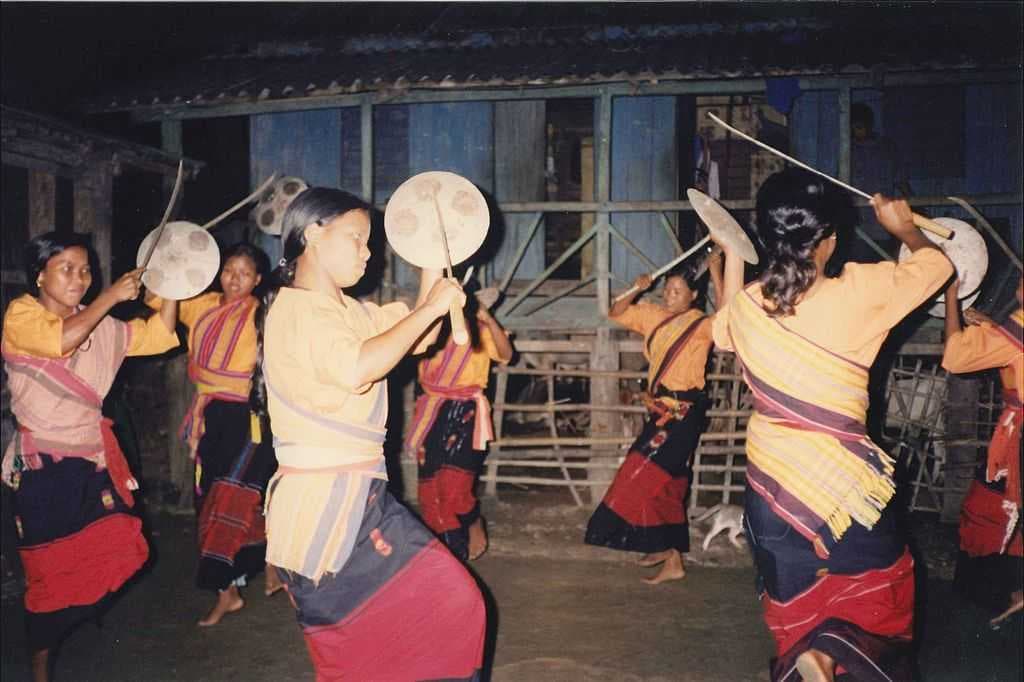 Rabha girls performing war dance