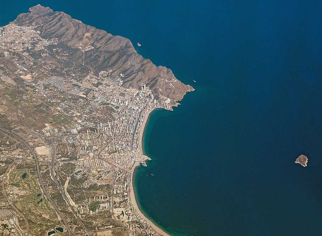 Aerial view of Benidorm and Benidorm Island looking eastward (May 2018).