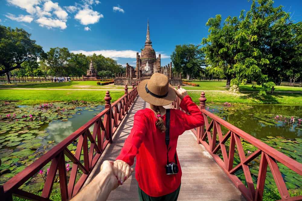 Touirst Couple at Sukhothai, Thailand
