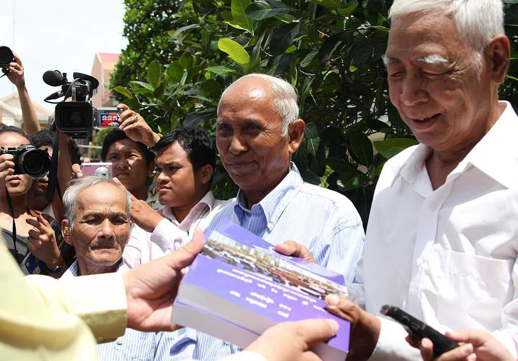 Bou Meng (left), Chum Mey (center) and Vann Nath (right) after having received a copy of the Duch verdict on August 12, 2010. They are three of only a handful survivors from the secret Khmer Rouge prison S21 where at least 12,273 people were tortured and executed.