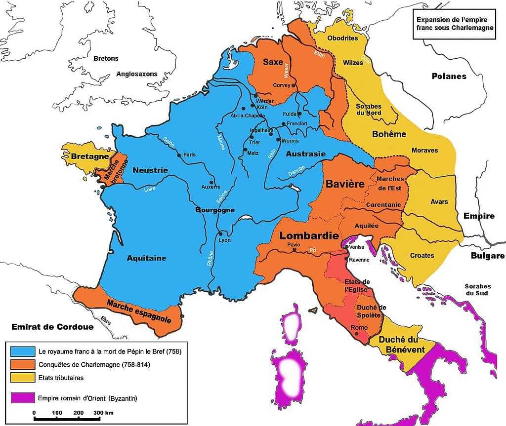 Expansion of the Frankish Empire:Blue = realm of Pepin the Short in 758;Orange = expansion under Charlemagne until 814;Yellow = Marches and dependencies;Red = Papal States.
