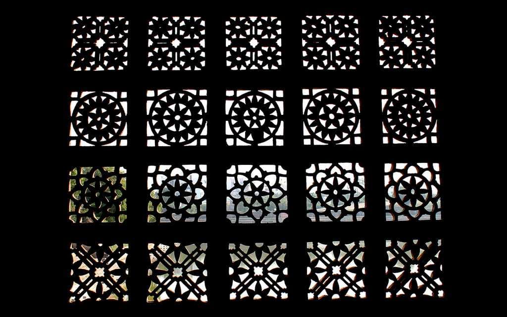 Exquisite artwork in a window at Sarkhej Roza.
