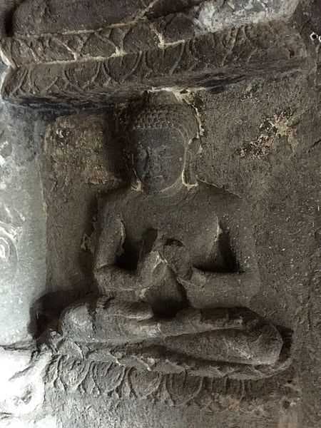 Buddha in meditation inside the Aurangabad Caves