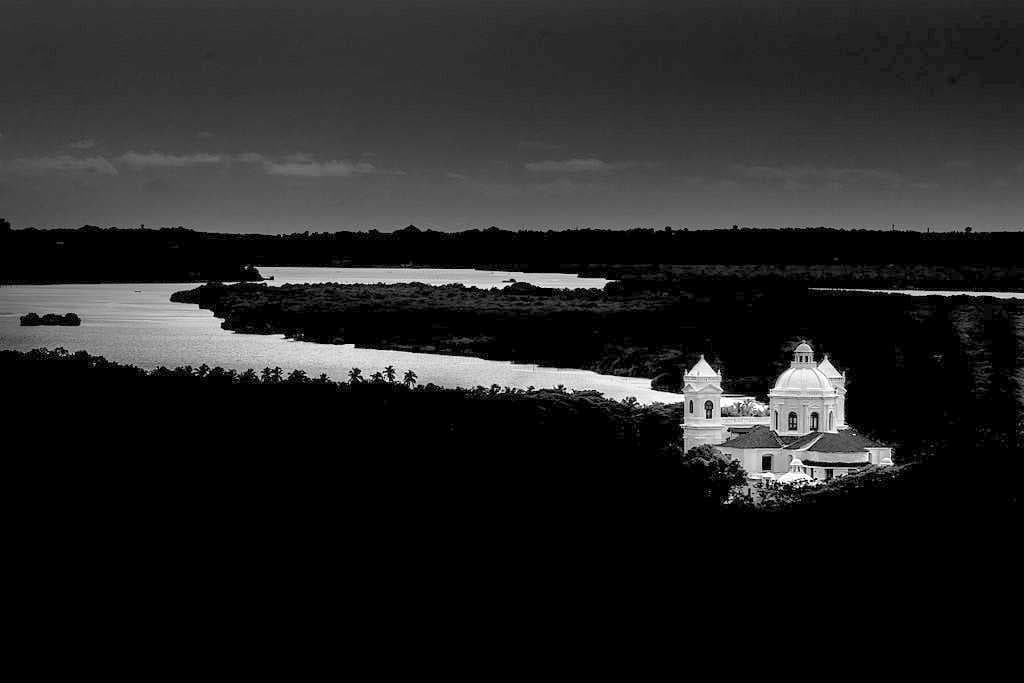 The church in the backdrop of the Mandovi River