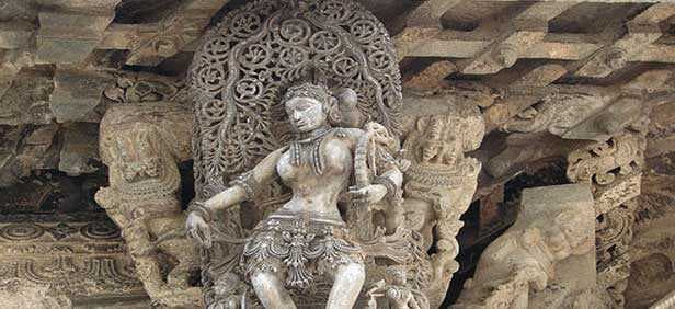 Carving of Krishna in the walls of the Belur Halebid temple
