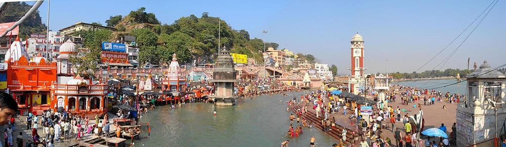 Panoramic view of Har Ki Pauri, Haridwar, showing Malviya Dwip (right), named after Madan Mohan Malviya, and Birla Tower, built 1936.