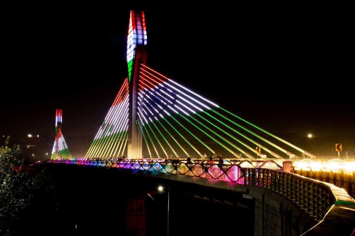 The Durgam Cheruvu Bridge lit up in the tri colours
