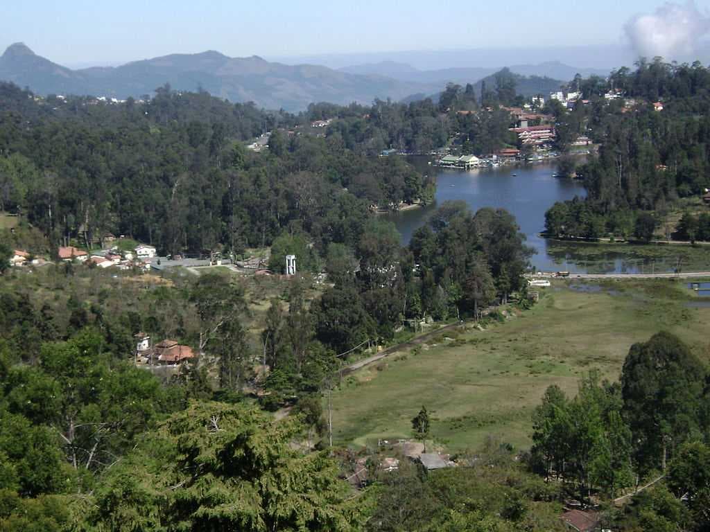 Kodaikanal lake View showing: Mount Perumal, Boat house, Carlton Hotel, Kodaikanal International School, Fish hatchery, Lake Road.