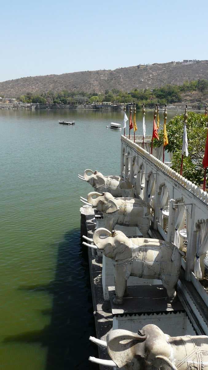 Carved statues of elephants at the jetty entry, Jag Mandir Palace.
