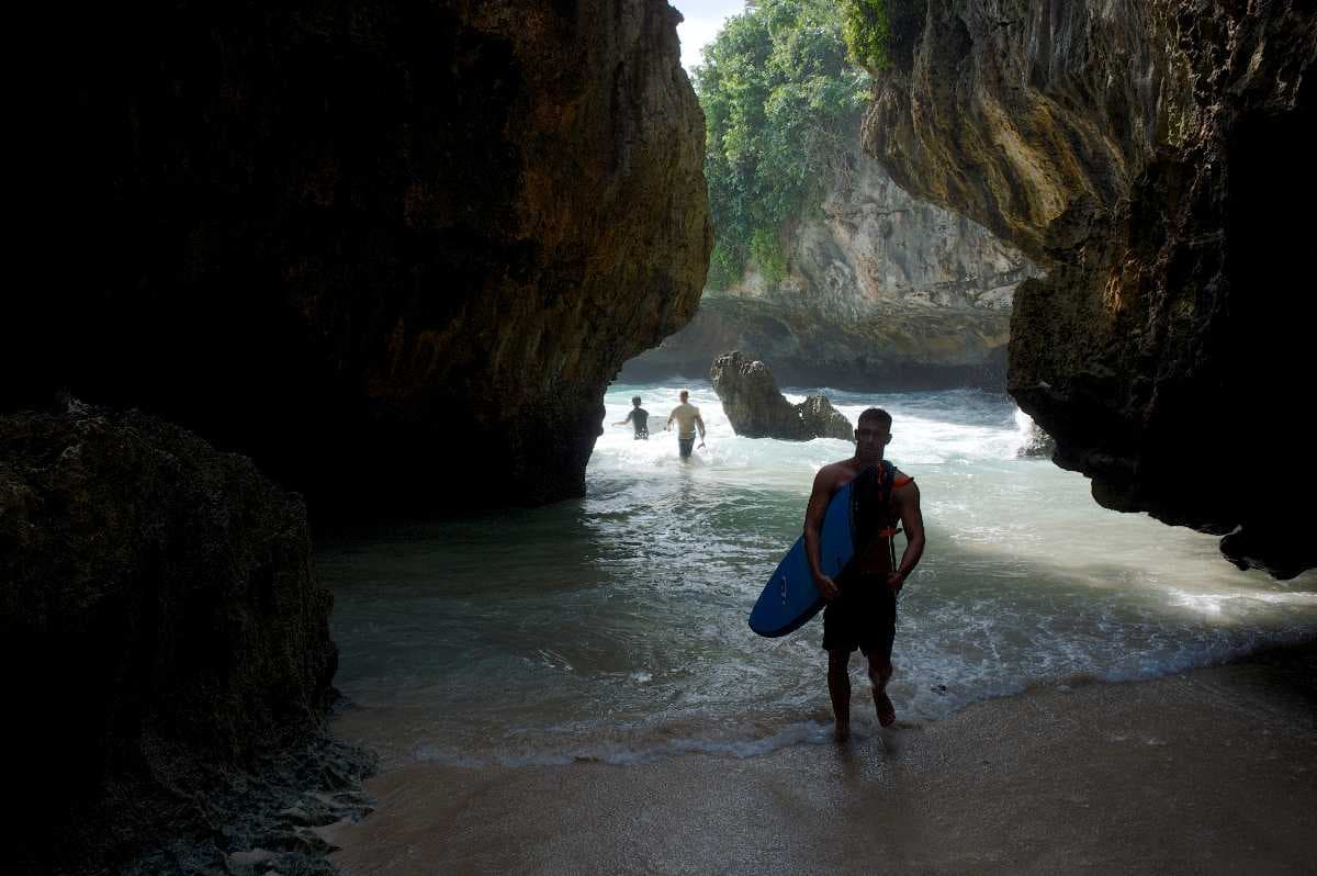 Surfers in Suluban Beach, Bali
