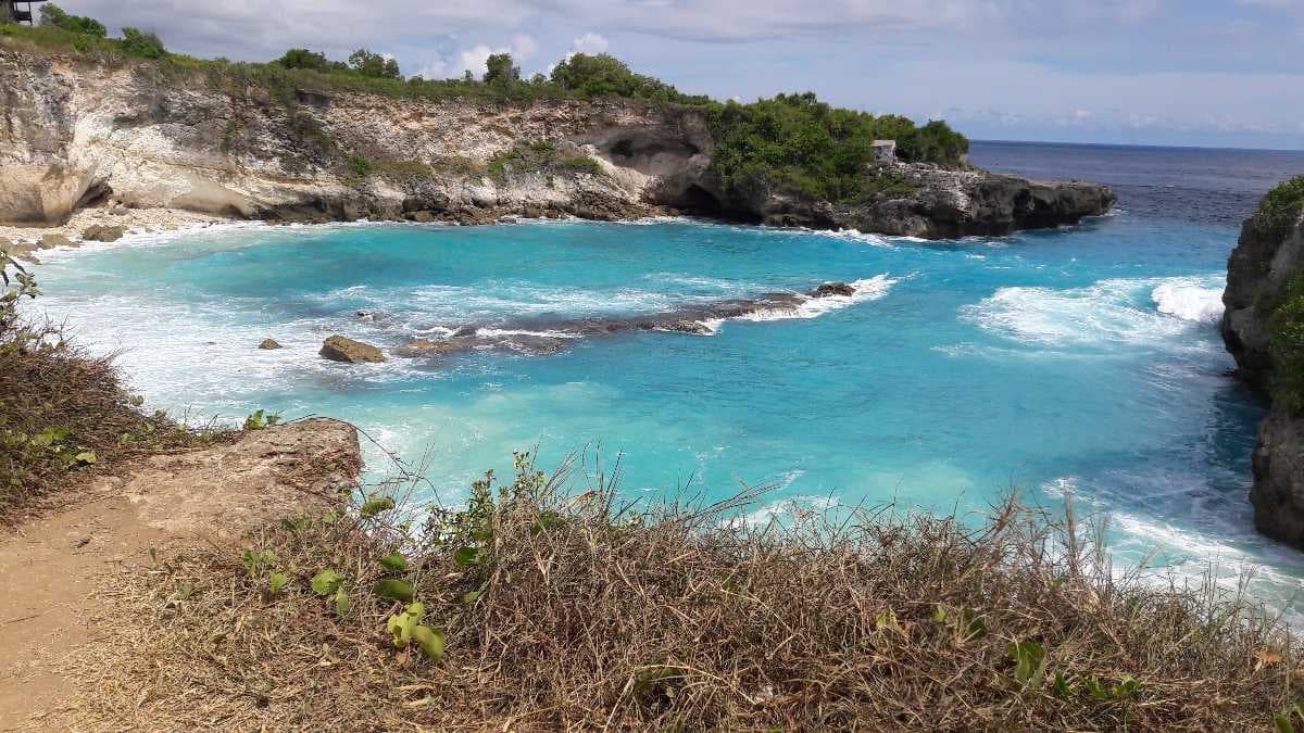 Blue Lagoon - Rocky Cliff with Turquoise Water