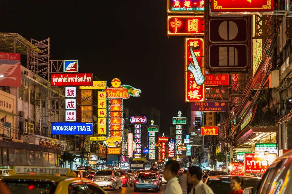 Khao San Road is famously known as the backpacker's haven. The 410-meter-long street in is lined with street food stalls, bars, shops, restaurants, nightclubs, cafes, and massage parlors.