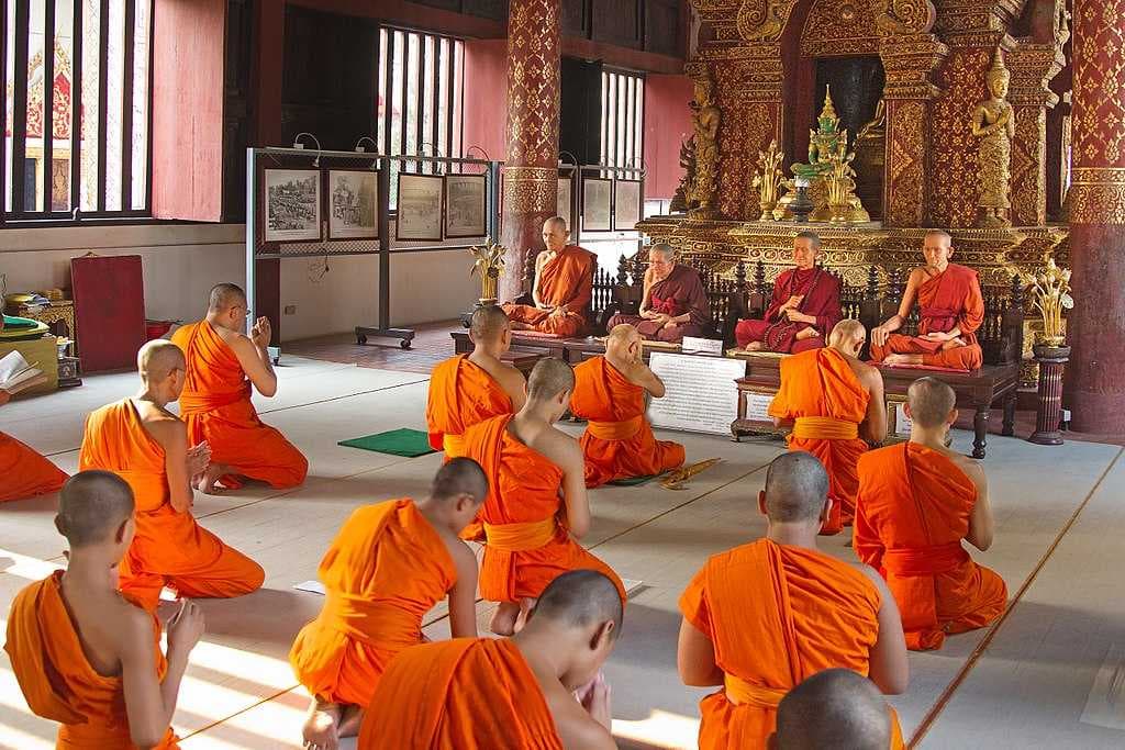Buddhist monks in the ubosot of Wat Phra Singh