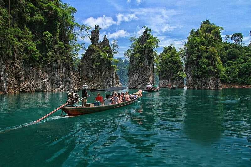 Tourists Enjoying Long Tail Boat Tours