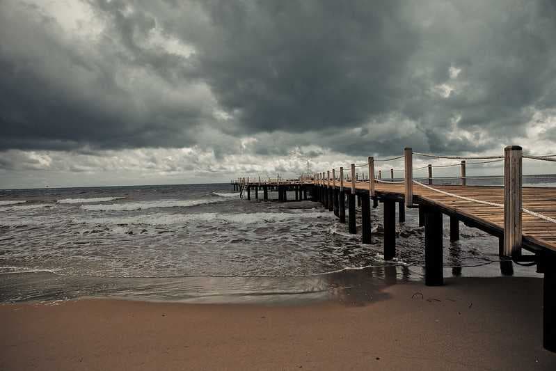 A scenic vista of the pier at Side's West Beach