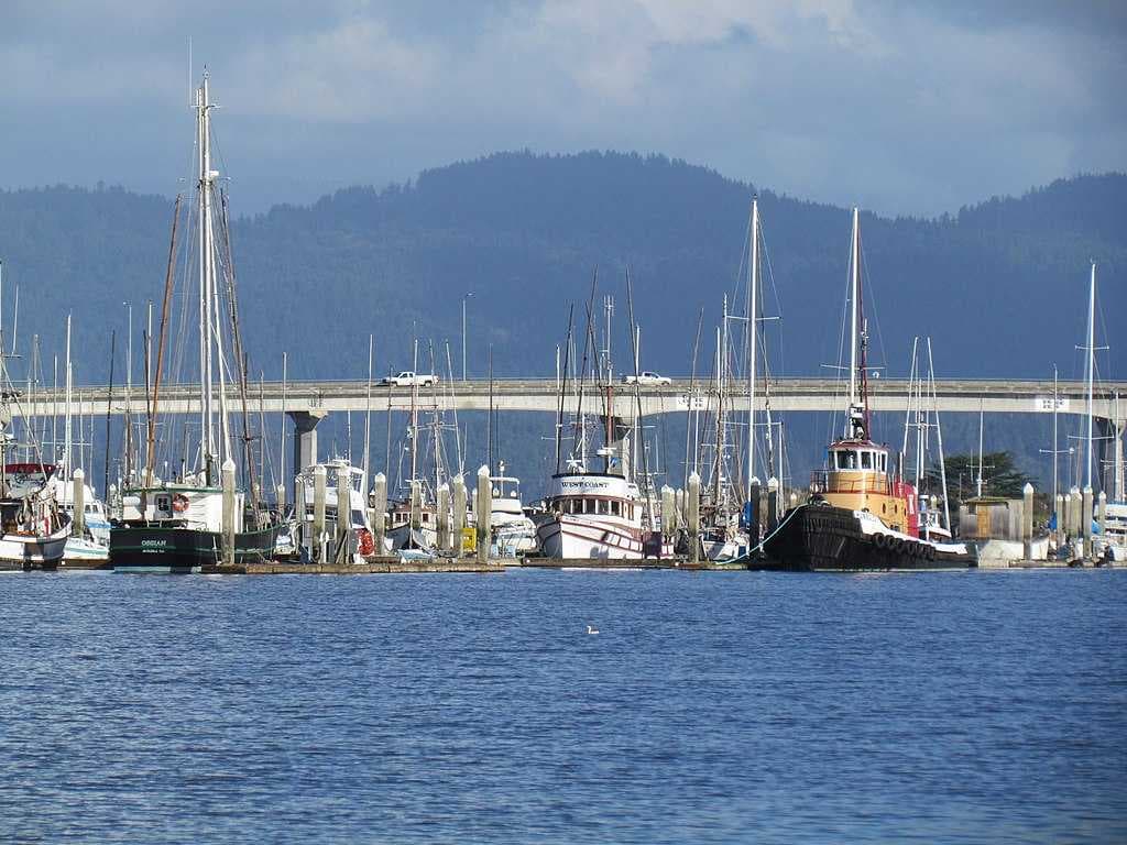 View of southernmost span of Route 255 "Samoa Bridge." Woodley Island Marina (on Humboldt Bay), Eureka, is visible in the foreground with northeasterly views of Fickle Hill (Coast Ranges) in the background.