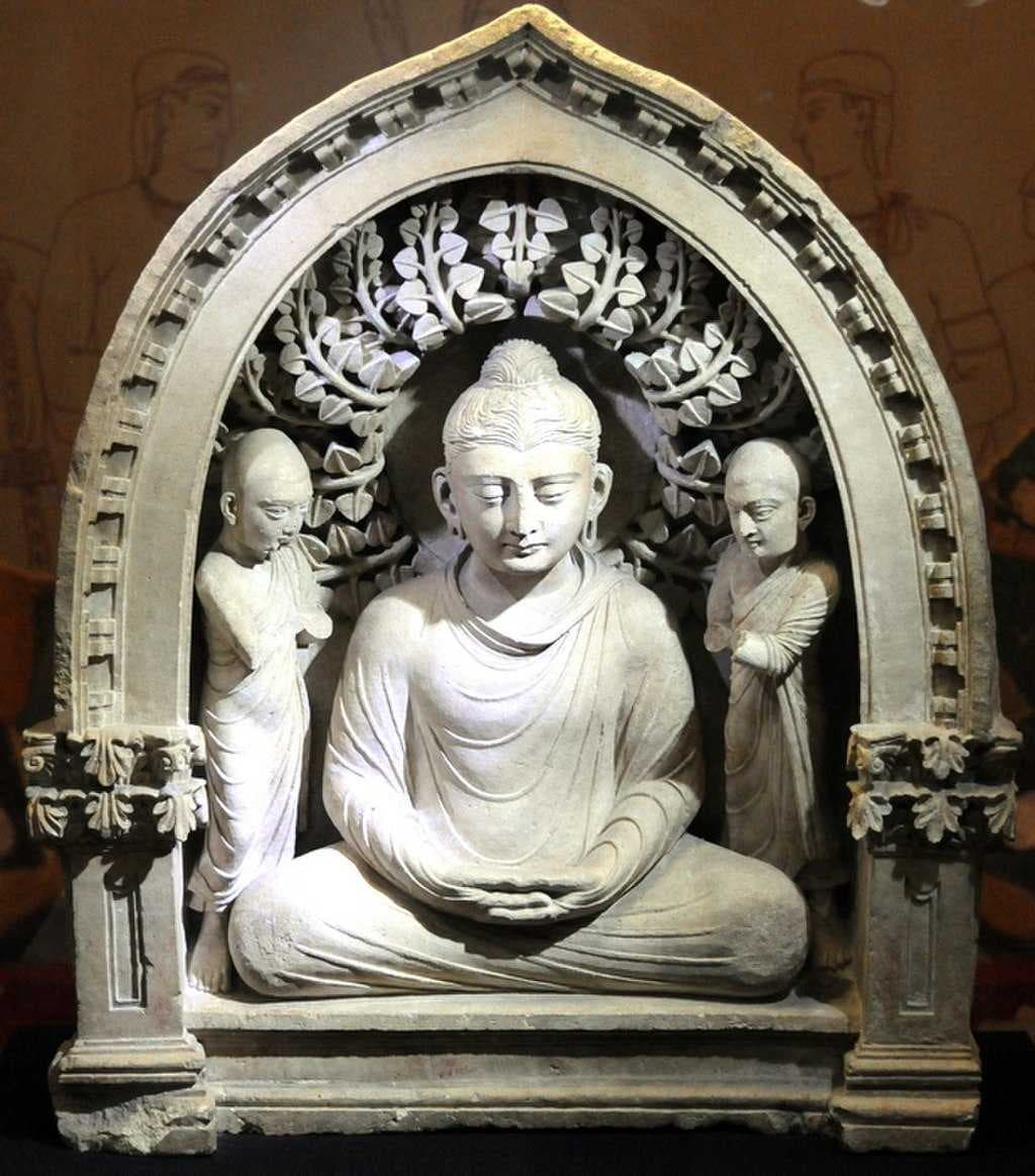 Buddha with monks, from Fayaz Tepe.