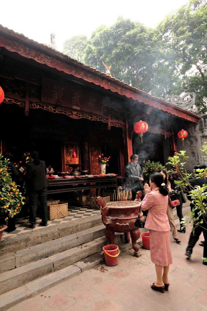 Devotees Praying at Quan Thanh Temple, Hanoi
